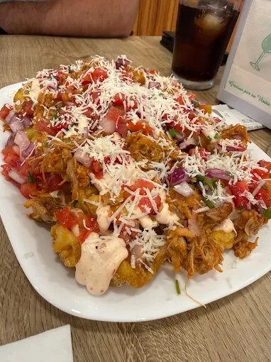 Patatas Reinonas con carne pastor y pico de gallo